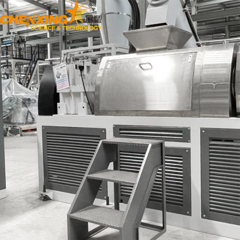 Plastic squeezer dryer pressing moisture from washed PE film flakes