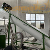 Friction washing loader