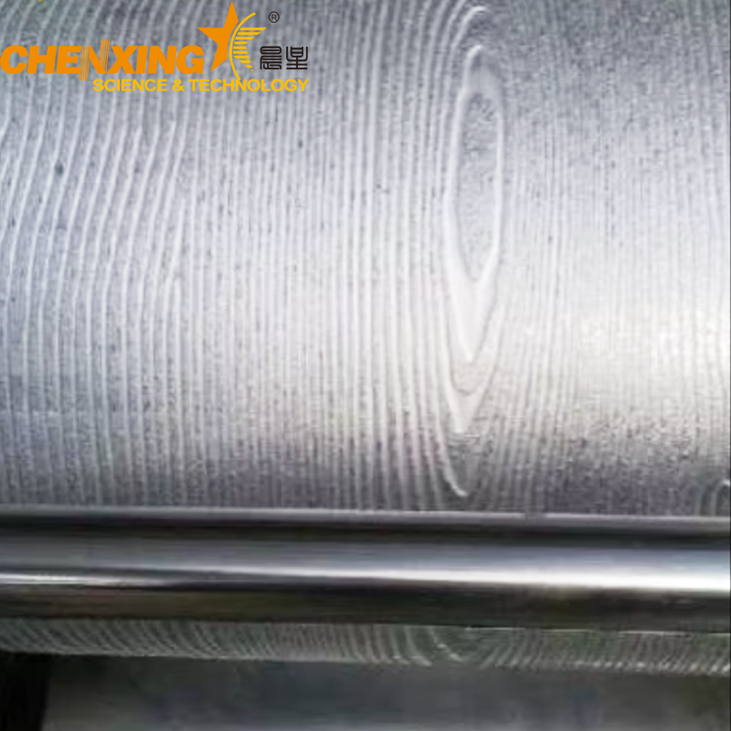 Automatic feeding embossing line for decorative board production.