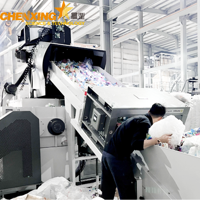 Industrial plastic recycling line for printed films and laminated waste