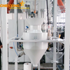 Bulk bag unloader with sealed dust-free feeding system