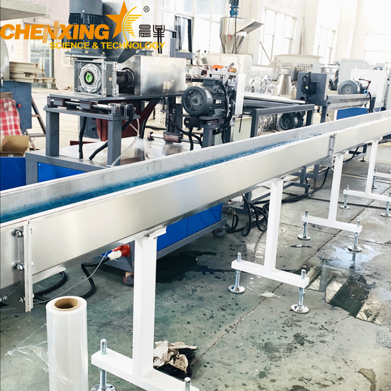 Industrial PVC spiral hose extrusion machine in operation