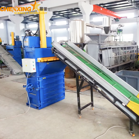 Vertical hydraulic baler VB-40 — front view showing feed opening and control panel.