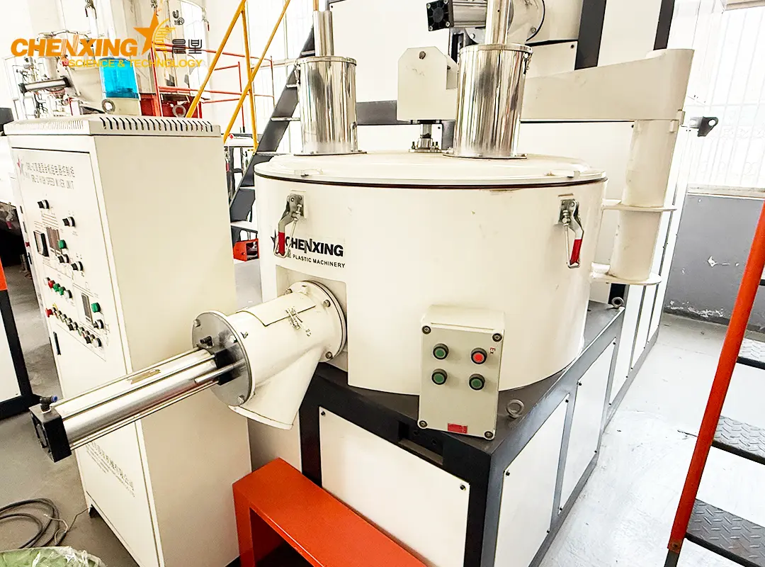Cutaway technical diagram of SRL-Z self-friction heating mechanism showing material flow vortex inside the vertical mixing chamber with orange-gold energy visualization 