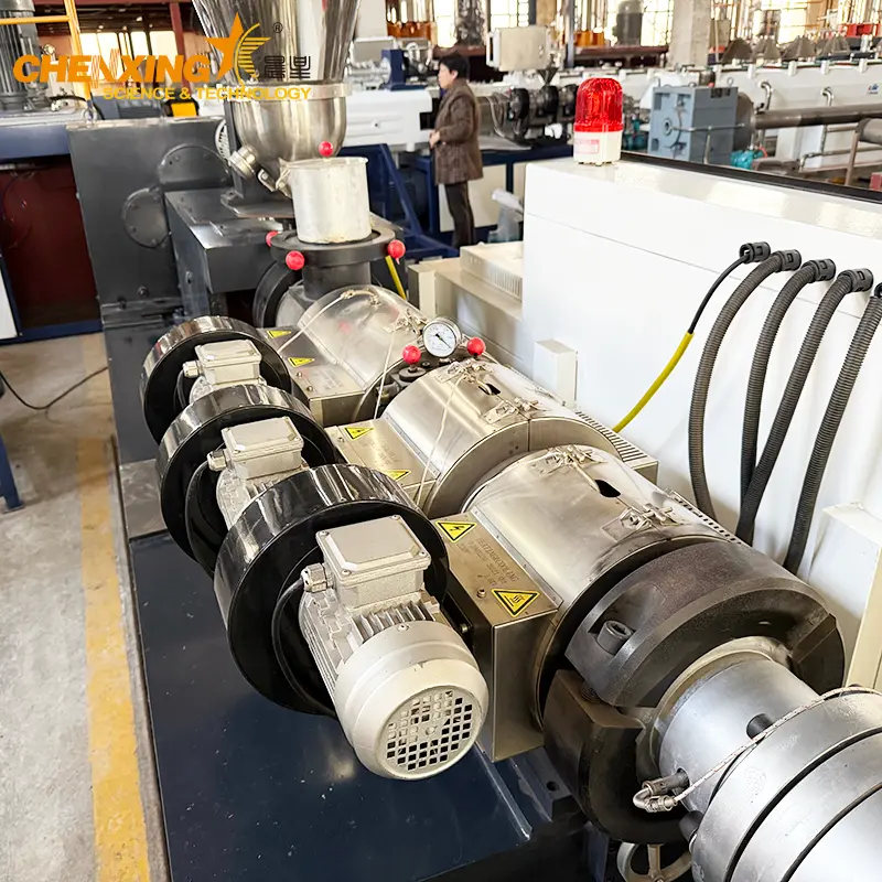 Close-up of SJSZ-65 conical twin screw pair with 65132 mm diameter &mdash; counter-rotating outward configuration, segmented conveying and kneading elements, nitride-hardened flight tips for rigid PVC pipe productio