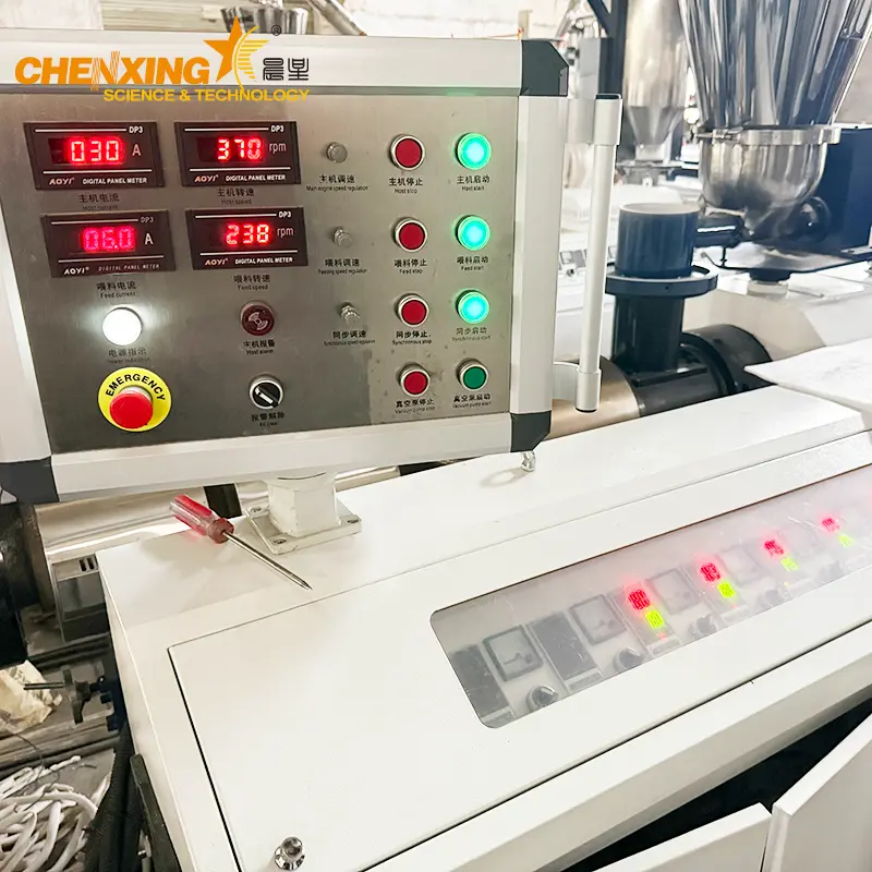 SJSZ-65 conical twin screw extruder complete assembly &mdash; counter-rotating screw pair, 37 kW main motor, 5-zone PID temperature control, and vacuum feeding hopper for direct PVC powder extrusion at Chenxing Mach